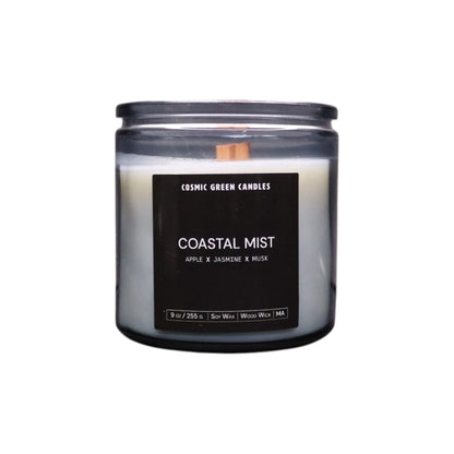 Coastal Mist candle in a serene blue jar, evoking the fresh scent of ocean air.