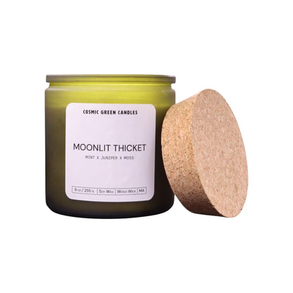 Moonlit Thicket soy candle with a woodsy and earthy fragrance, handcrafted by a sustainable small business.