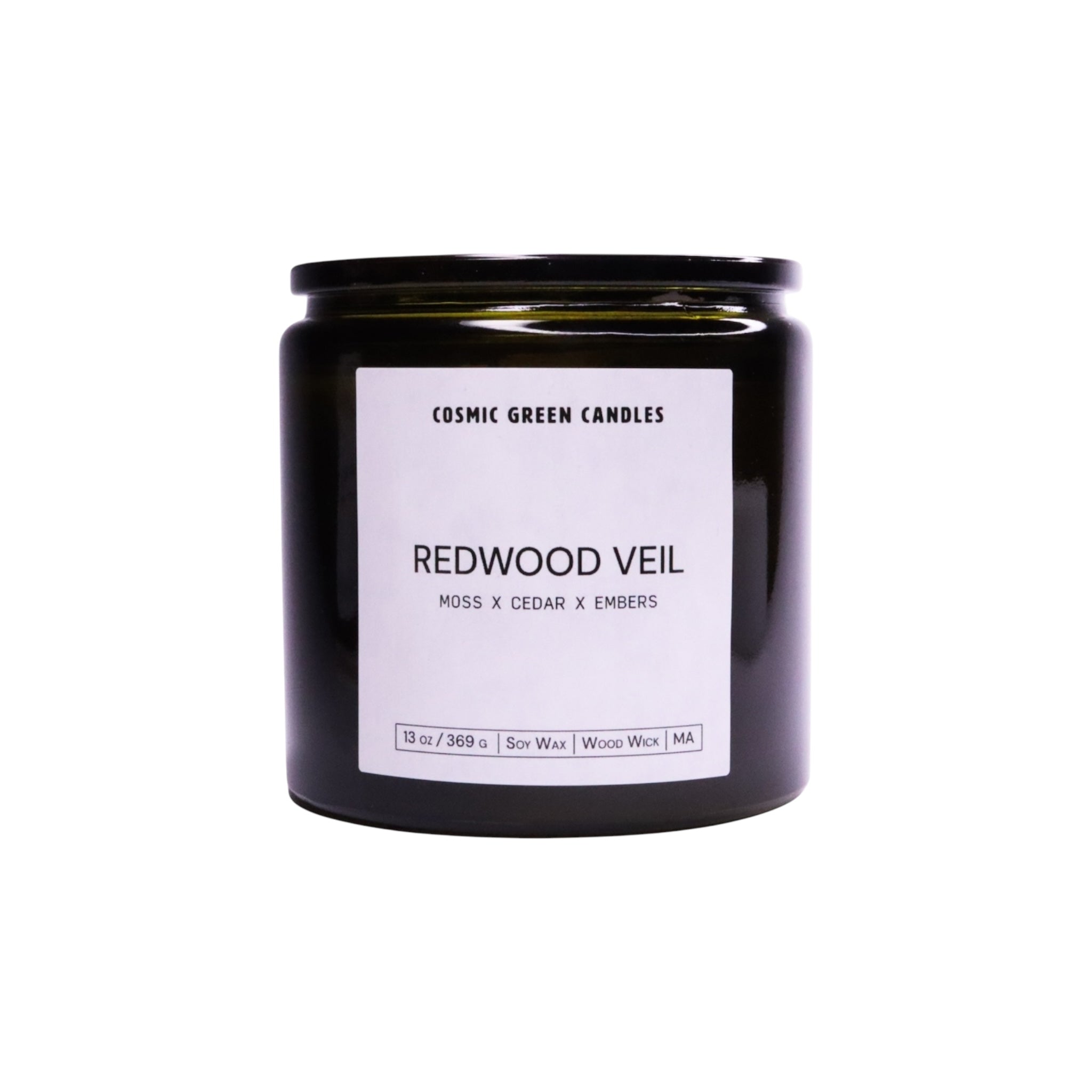 The Redwood Veil candle captures the essence of towering redwoods with its earthy aroma, made with soy wax.