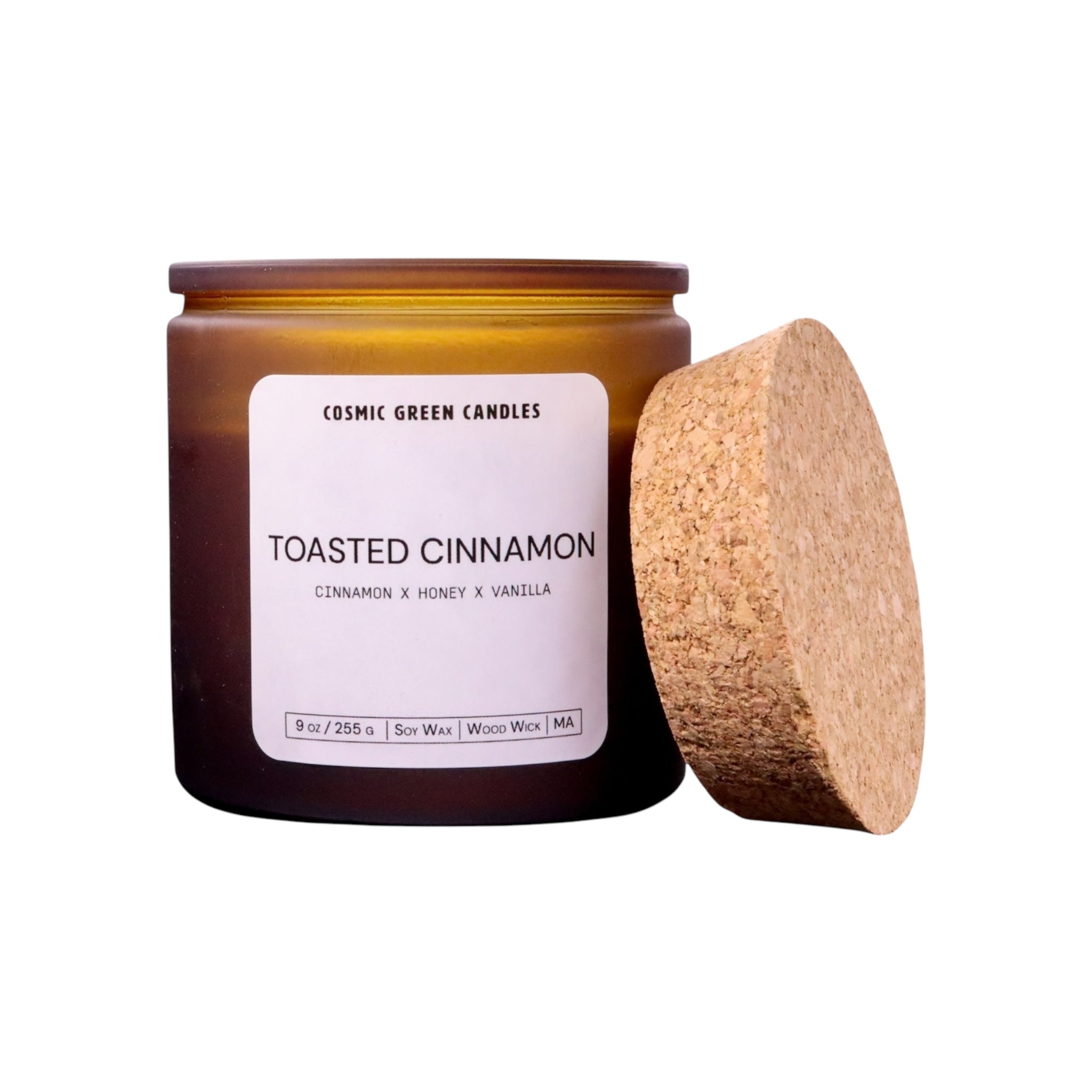 Toasted Cinnamon candle with a warm, spicy aroma, made from soy wax and featuring a crackling wood wick.