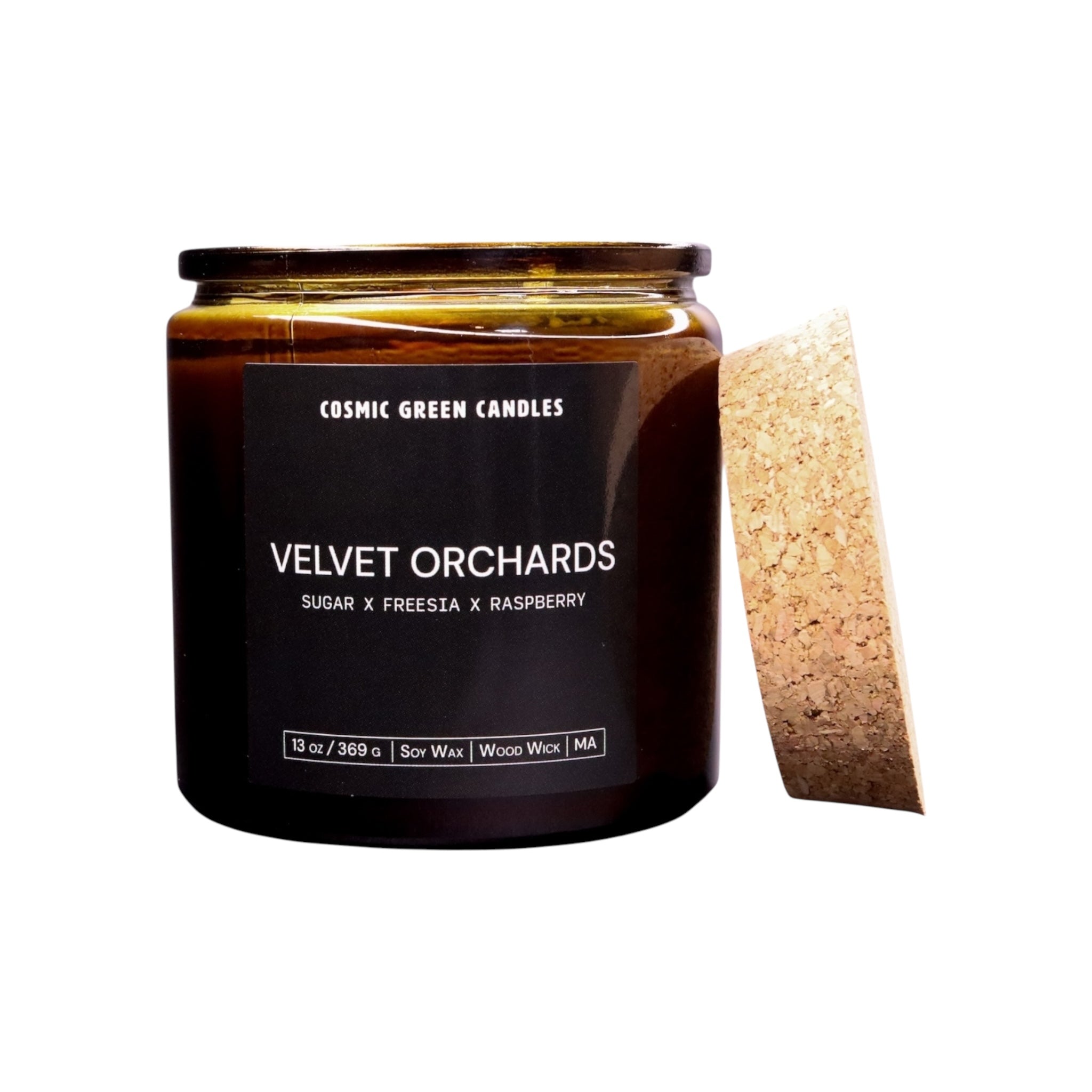 Velvet Orchards candle with a fruity and floral fragrance, handcrafted using sustainable soy wax.