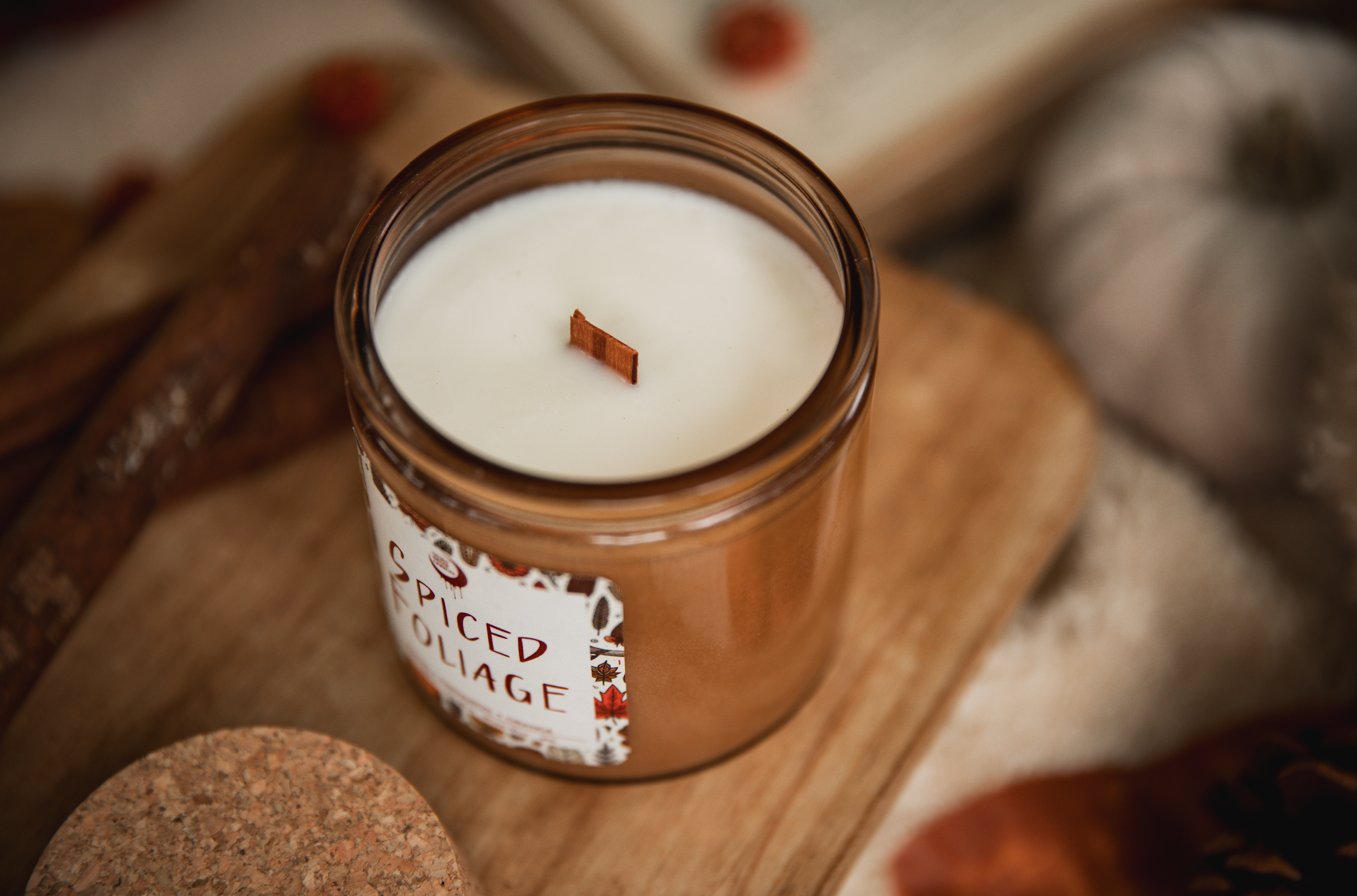 Wood wicks crackling in soy wax candles.